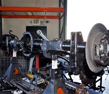 image of axle getting worked on